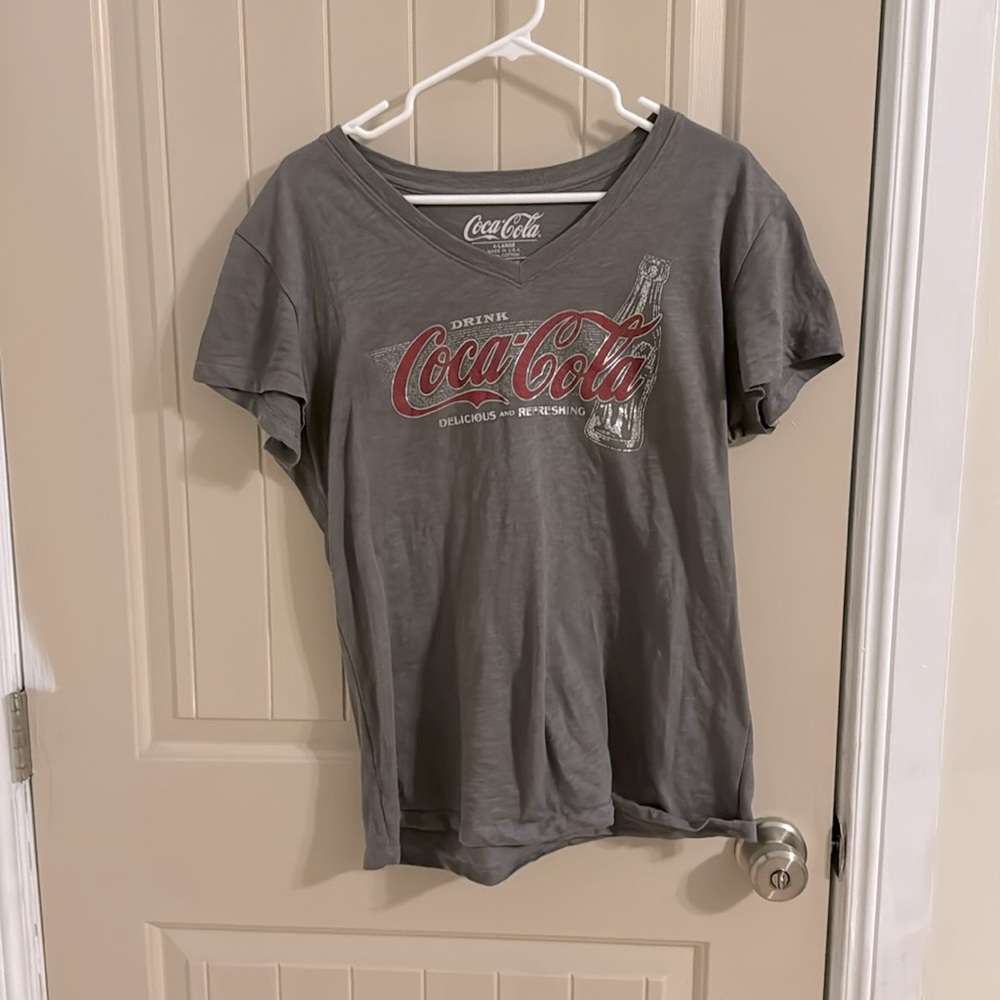 Coca  cola t shirt short sleeve grey with red and silver writing